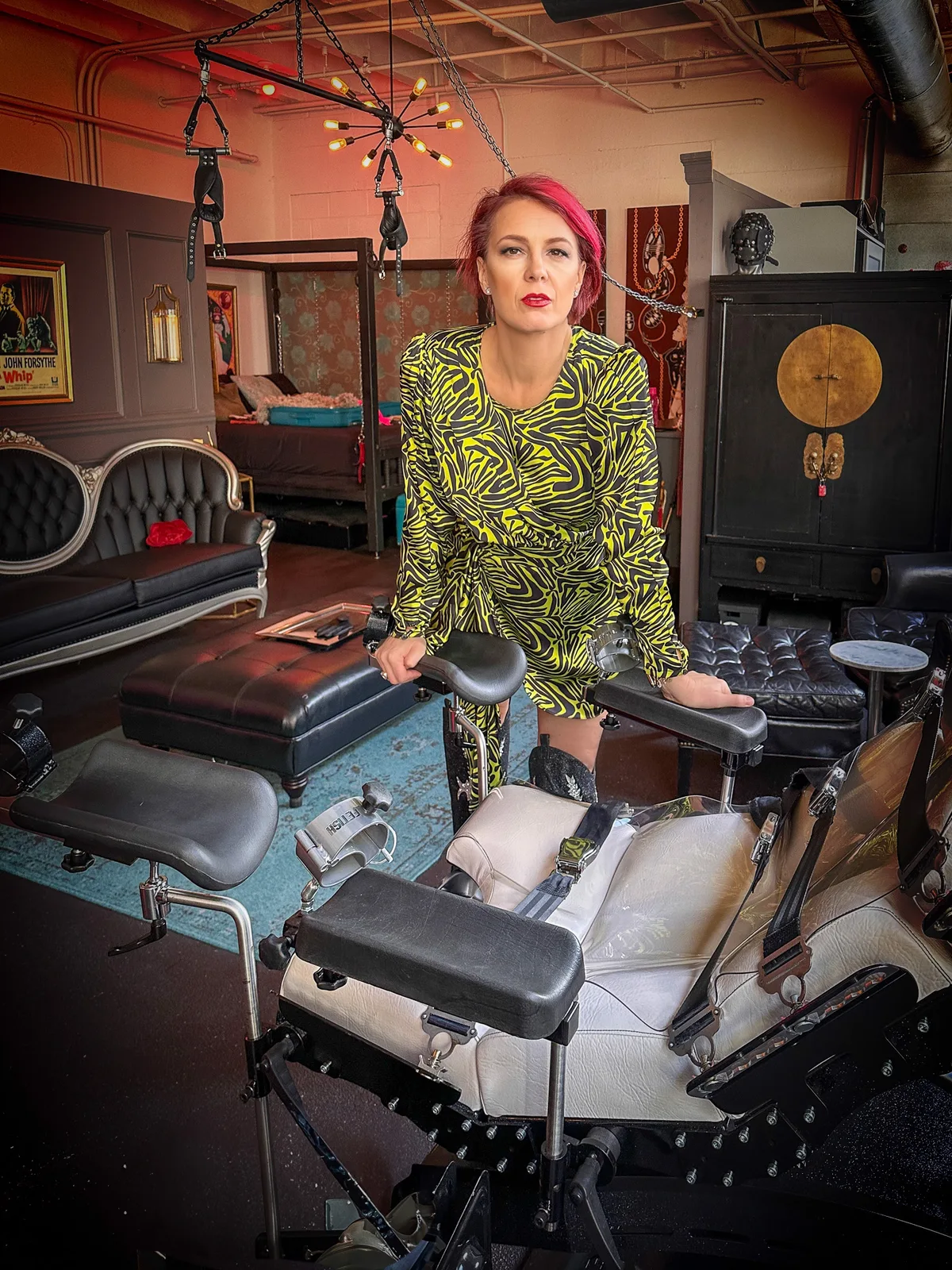 BDSM bondage chair in a Manhattan dungeon — classes and workshops imagery.