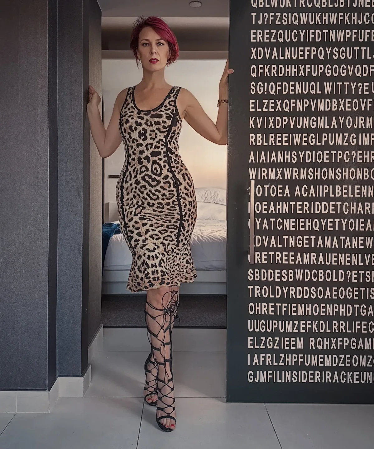 Viktoria Sway in lace-up heels — composed, in the room