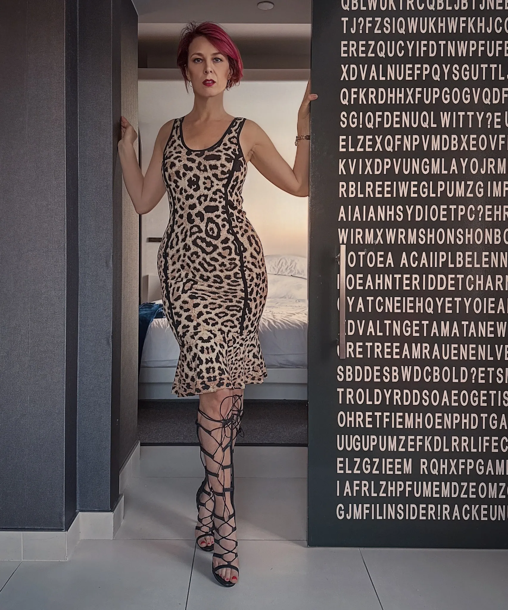 Viktoria Sway in lace-up heels — composed, in the room